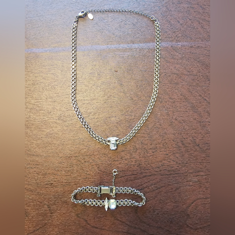SORRELLI necklace and bracelet set. EUC. On Silver with clear stones.